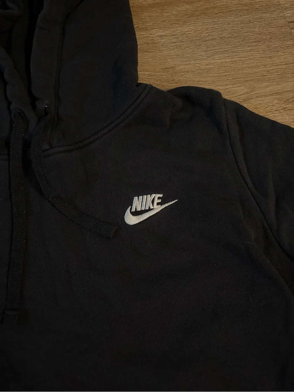 Nike Black Hoodie with White Swoosh Logo